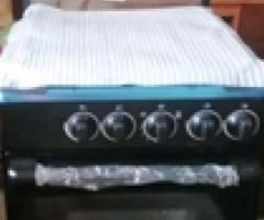 4 burner gas cooker with oven brown new - Apapa